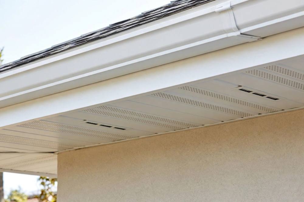 Soffit and fascia repair at a roof edge